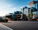 Professional Commercial Vehicles wrapped with custom branding by MSC Branding Services driving through Boston to increase business visibility and mobile advertising.